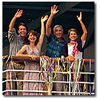 people on a ship waving goodbye